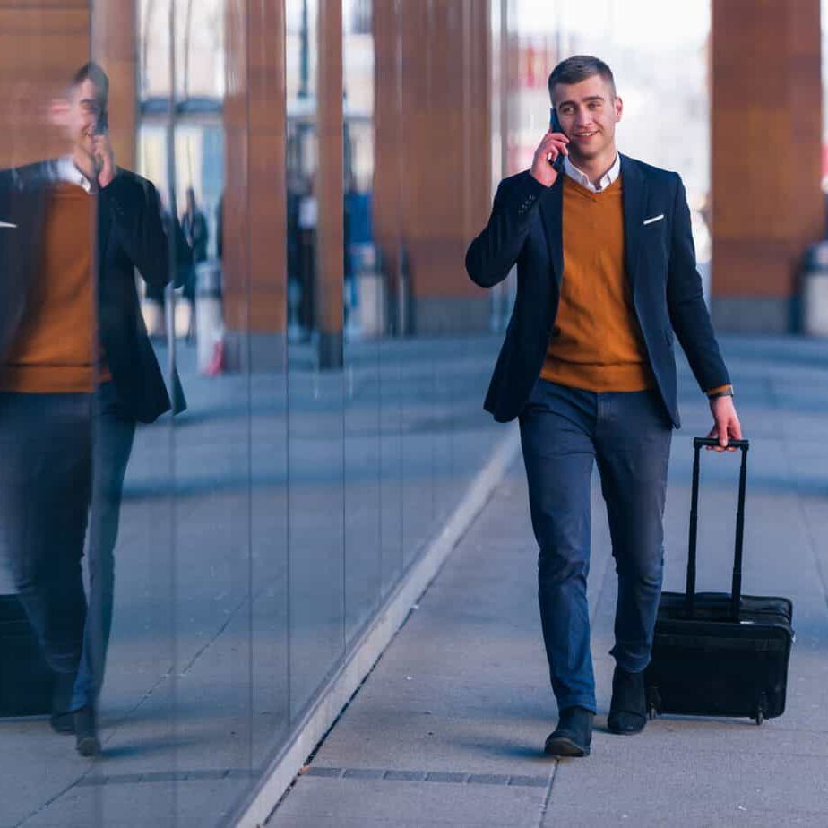 businessman-travelling-at-airport-scaled businessman-travelling-at-airport-scaled